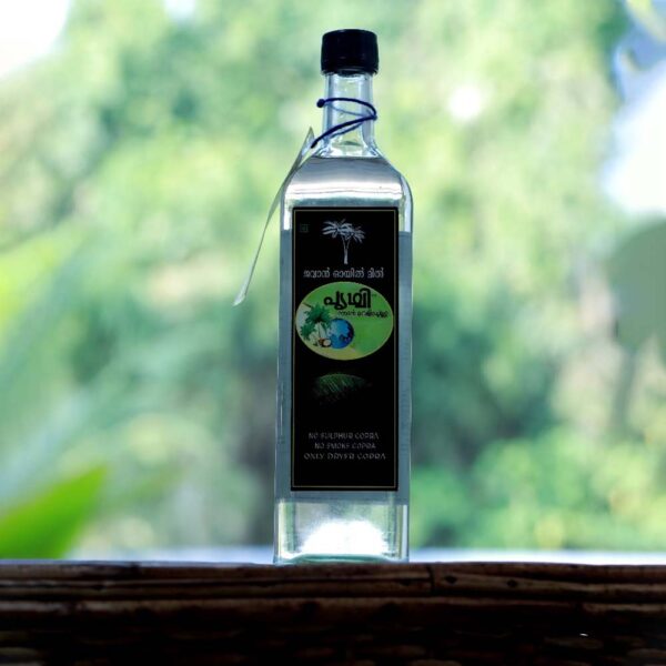 Jawan Prithvi pure coconut oil in 1 litre glass bottle with label showing no sulphur copra, no smoke copra, only dryer copra